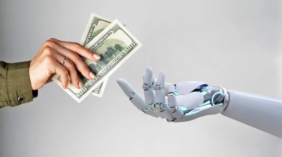 Mão segurando dólares e colando na mão de um robô